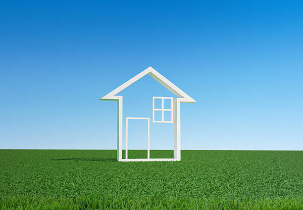 istock house symbol on green grass 585493076