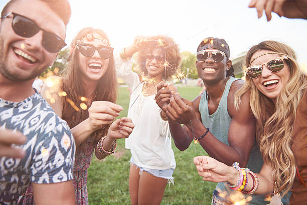 istock Group of friends with some sparklers 585493548