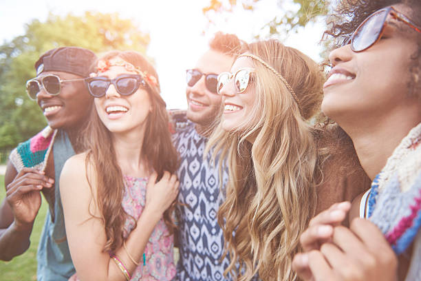 istock Group of friends covered with a blanket 585494228
