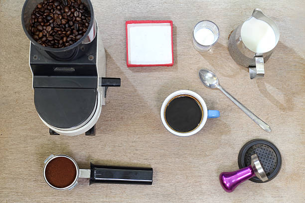 istock Coffee, coffee bean, coffee and wood on the floor. 585497788