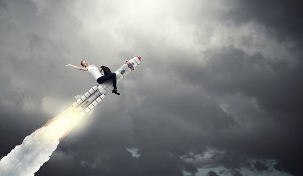 istock Woman riding missile . Mixed media 585498960