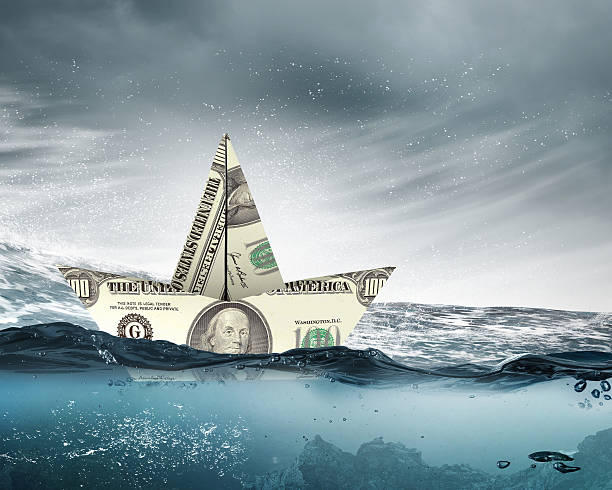 istock Dollar paper boat . Mixed media 585500724