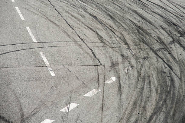 istock Tyre burnout marks on asphalt road 585502320