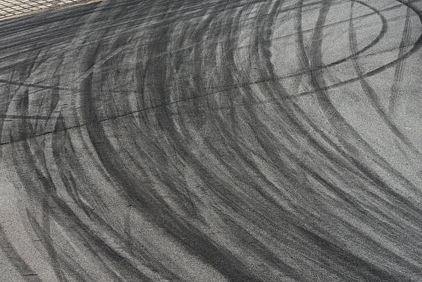 istock Tyre burnout marks on asphalt road 585502422