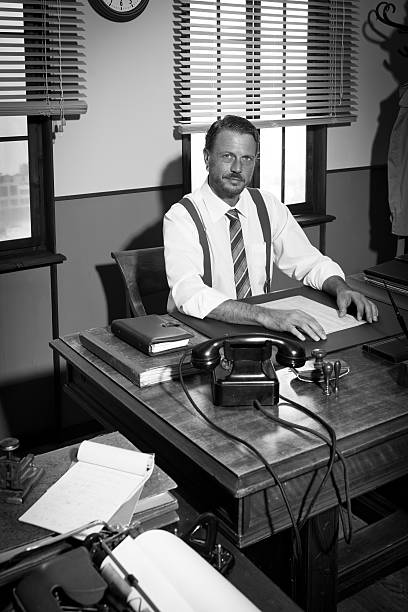 istock Confident businessman working at desk 585504288