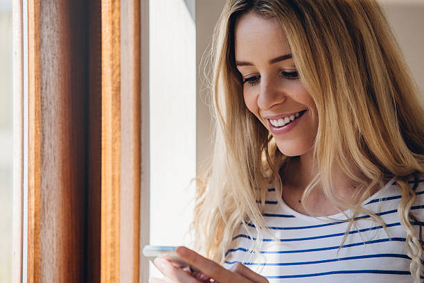istock Young Woman Using Smartphone 585505882