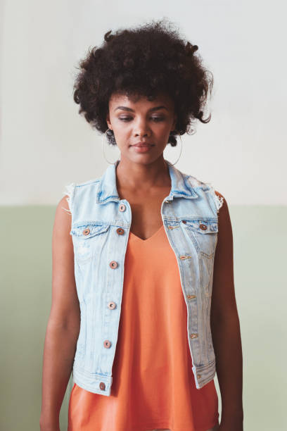 istock Attractive young woman standing alone 585506352
