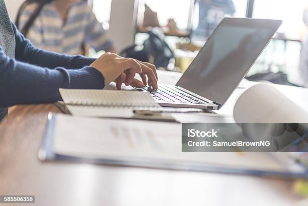 Closeup Of Businesswoman Hand Typing On Laptop At Workplace Stock Photo - Download Image Now