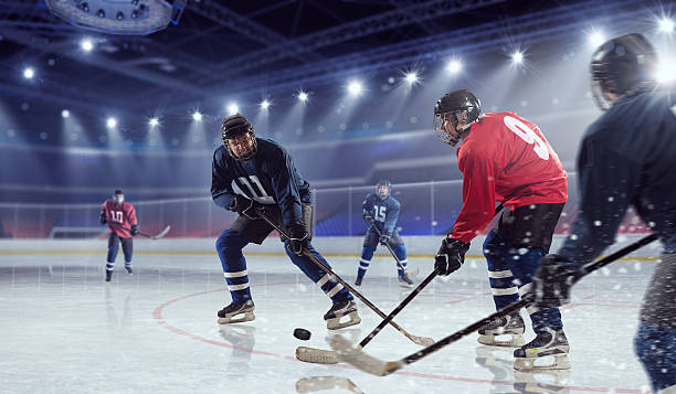 istock Hockey match at rink  . Mixed media 585506786
