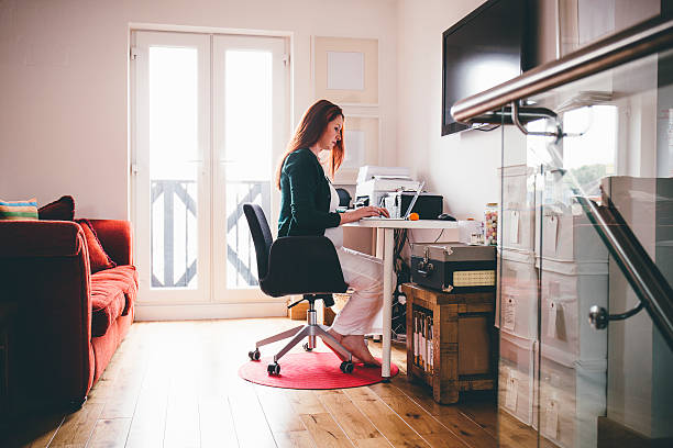 istock Pregnant Woman Working from Home 585507624