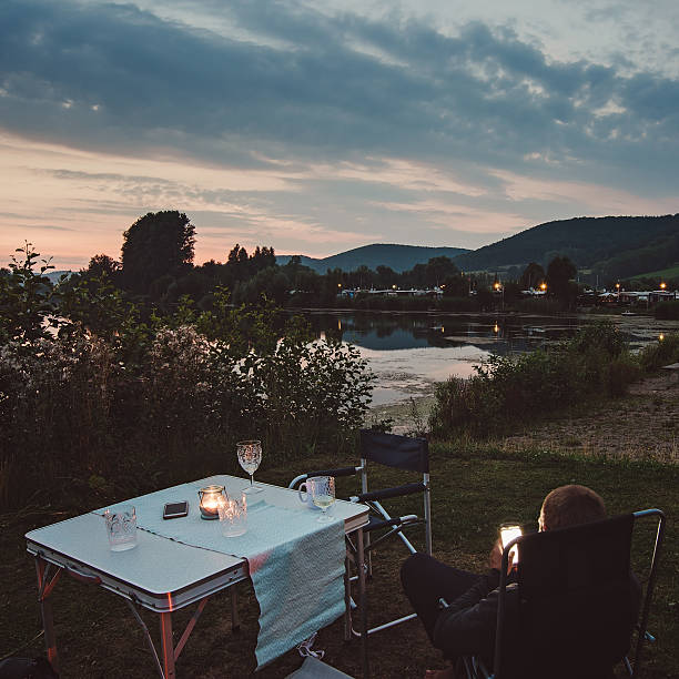 istock Man camping late evening on camp 585508158