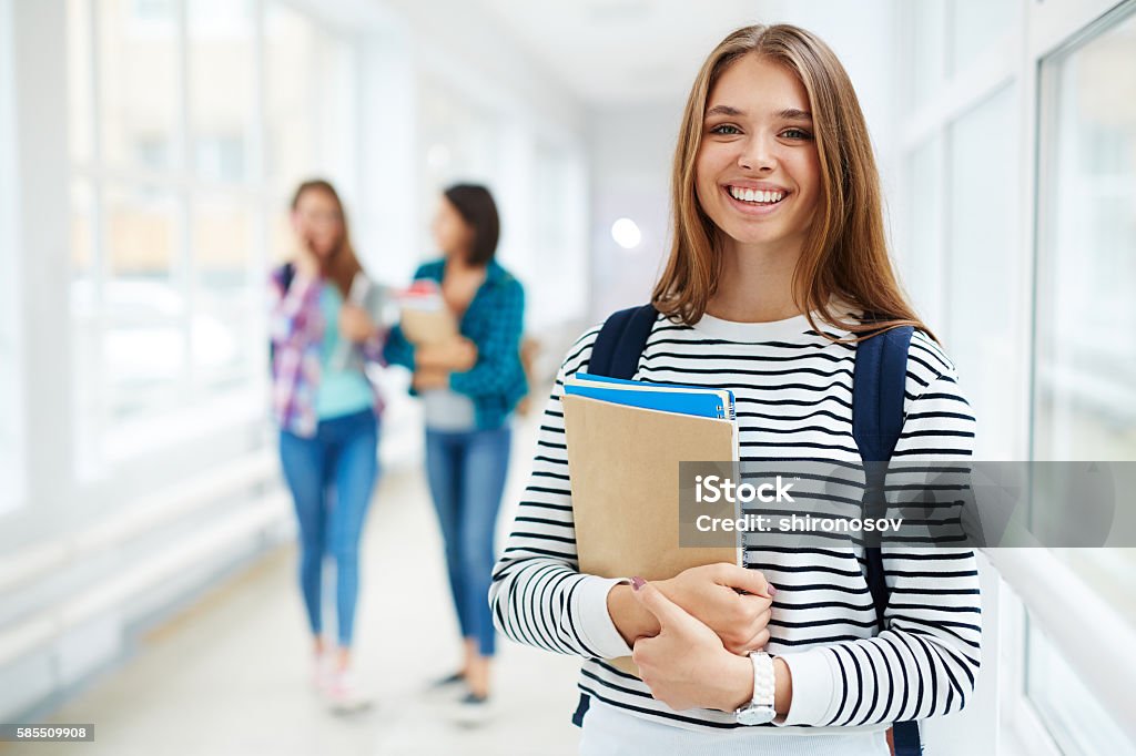 Studiare a college - Foto stock royalty-free di Studente universitario