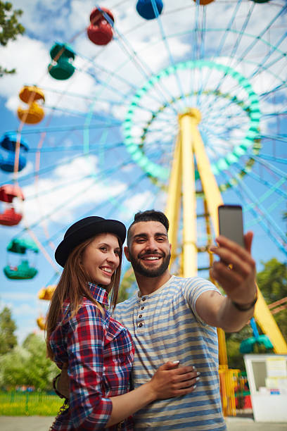 istock Couple in the park 585510356