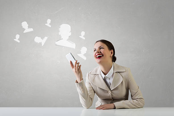 istock Attractive businesswoman having mobile conversation . Mixed media 585511020