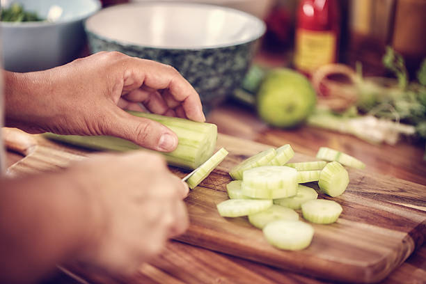 istock Preparing Asian Pickled Cucumber Salad 585512230