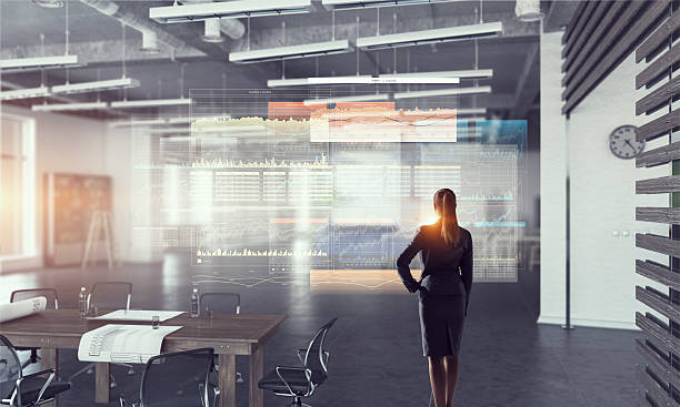 istock Businesswoman in modern office interior  . Mixed media 585513370