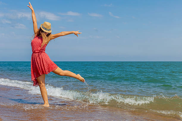 istock Woman having fun portrait on beach. 585516676