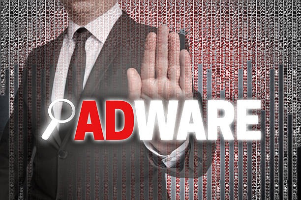 istock Adware with matrix is shown by businessman 585521142