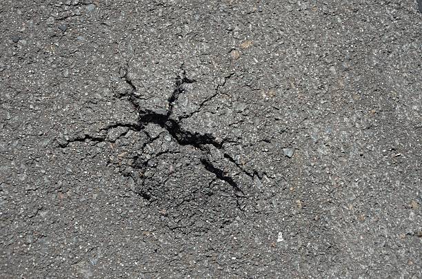 istock Crack of asphalt roads 585521424