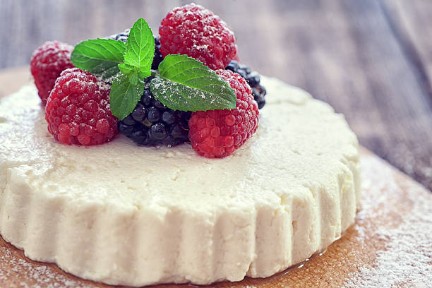 istock cottage cheese with fresh berry fruit and mint 585522018