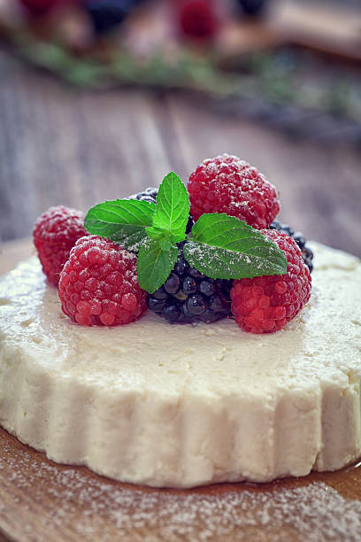 istock cottage cheese with fresh berry fruit and mint 585522068