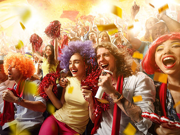 istock Sport fans: Group of cheering fans 585523110