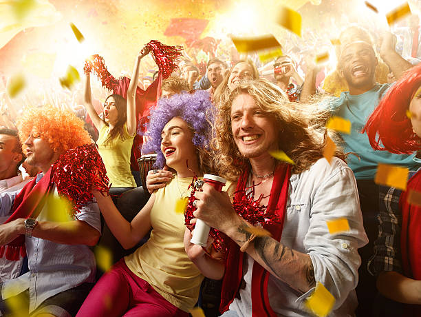 istock Sport fans: Group of cheering fans 585523424