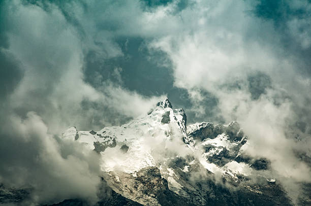 istock Storm Clouds Gather Around A Mountain Near Huaraz In Peru 585523940