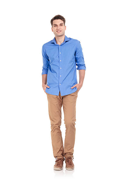 istock Happy young casual man smiling at the camera 585524446