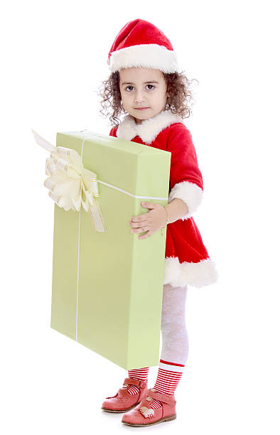 istock girl with a gift in their hands 585525122