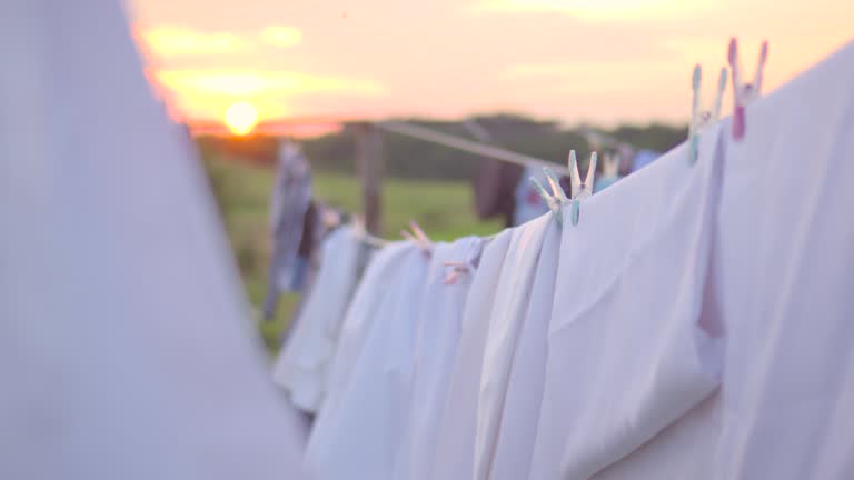 Clothing drying in the wind on sunset