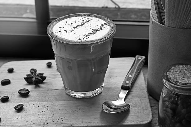 istock Coffee cup of cappuccino and coffee bean 585583160