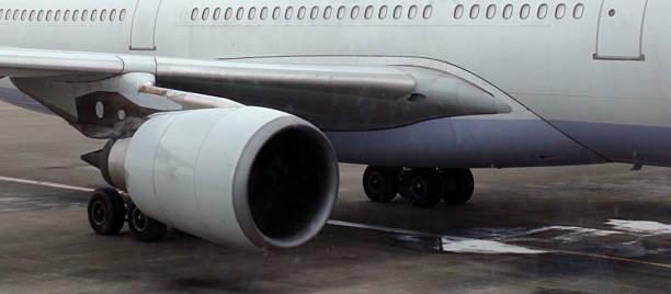 istock Airplane Exterior Window And Turbine Engine 585588652