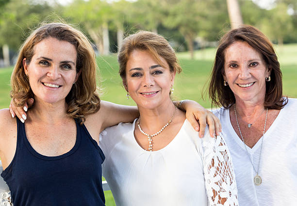 istock Mature women posing together 585589472