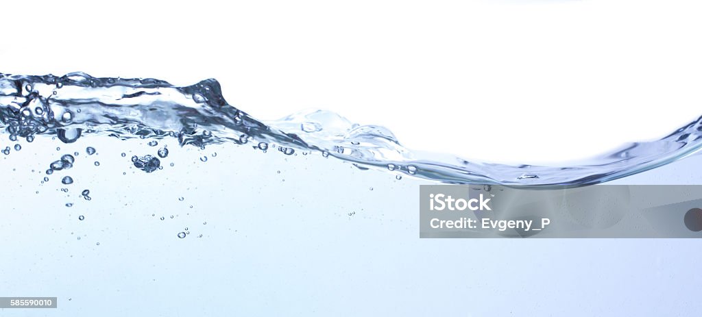 the surface of water the surface of water with underwater bubbles that move towards to the top of surface. There is a ripple on the water surface Water Stock Photo