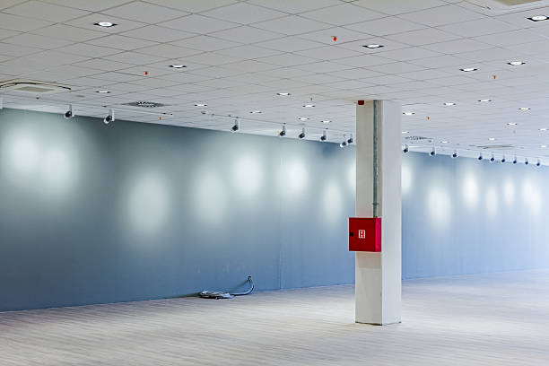 istock Modern showroom at business centre with ceiling floodligh 585590150