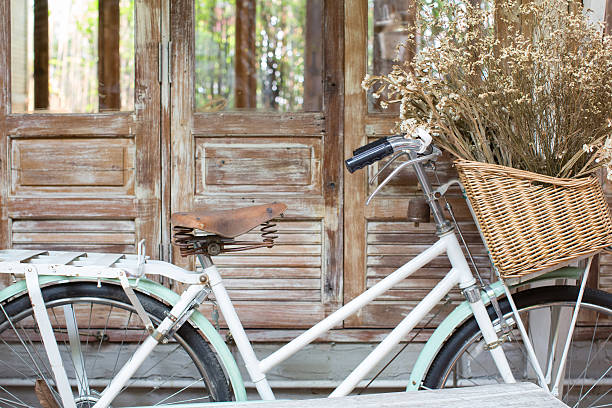 istock Bicycle with a basket of a dried bouquet 585591330