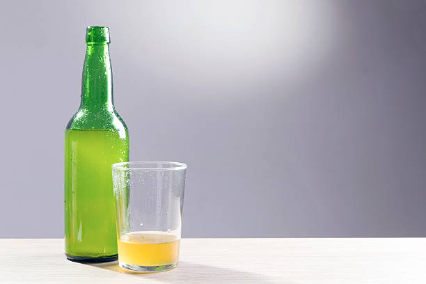 apple cider, over a grey background. - asturiana imagens e fotografias de stock