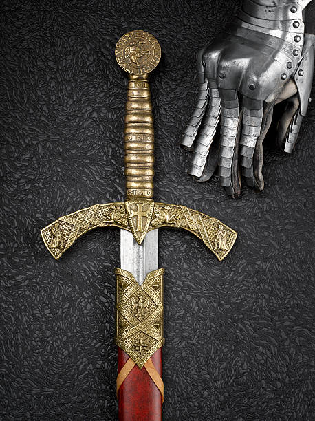istock Knight's gloves and sword. 585594722