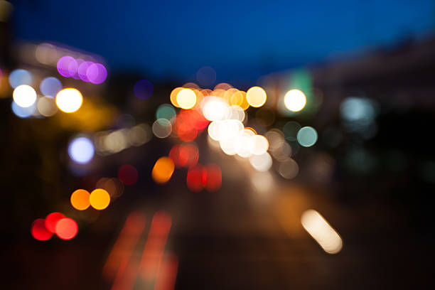 istock blurry background bokeh of traffic with night light 585595228