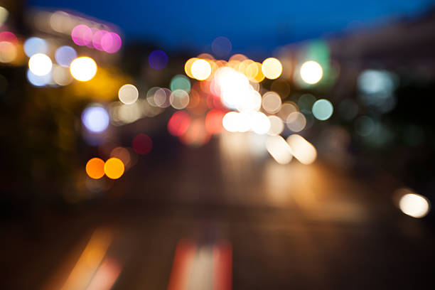 istock blurry background bokeh of traffic with night light 585595380
