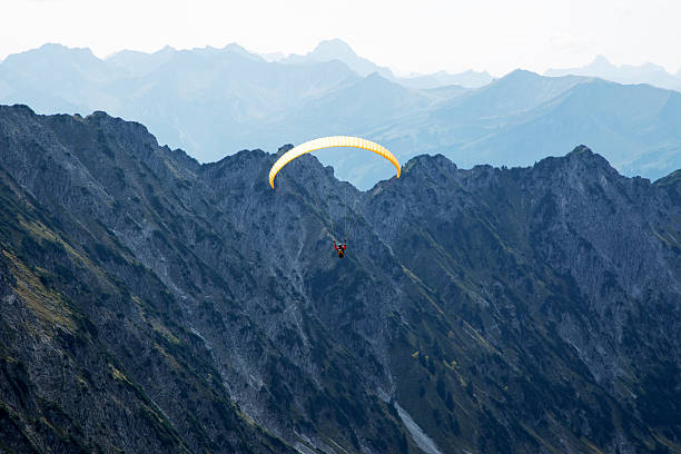 istock Paragliding from Nebelhorn Mountain / Bavaria 585595996