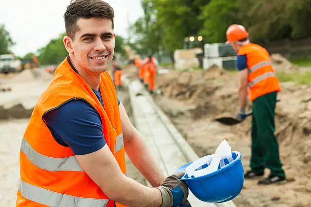 Photo of Smiling building worker