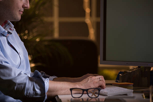 Man is a workaholic Young man is a workaholic in his life clerk jobs hiring,elite jobs stock pictures, royalty-free photos & images