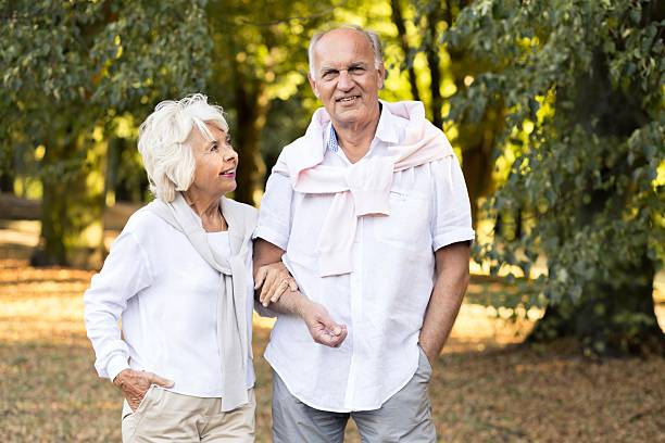 istock Senior marriage in the park 585599764