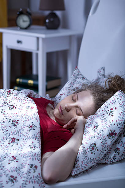 istock Lonely young woman sleeping 585599854