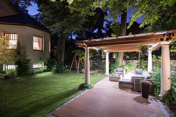 istock Garden with patio at night 585601010