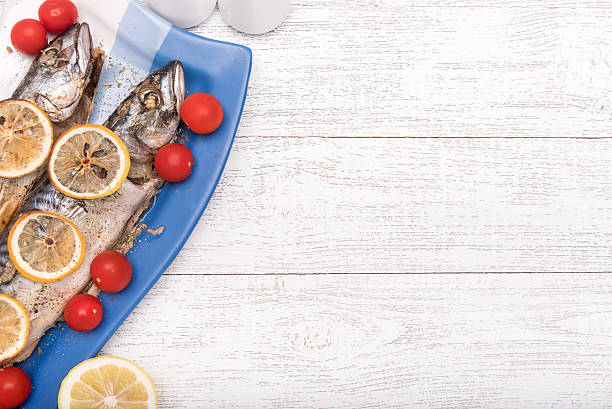 Grilled sea fish and vegetables.