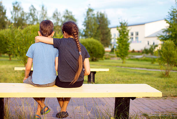 boy and girl embrace
