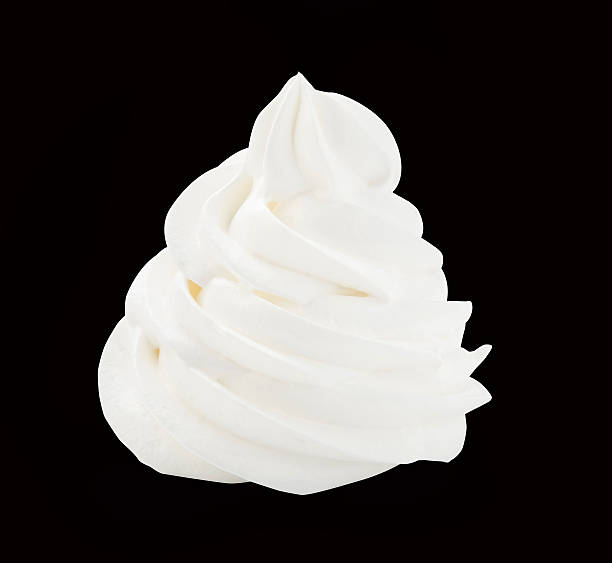 istock Whipped cream isolated on a black background with clipping path 585605528